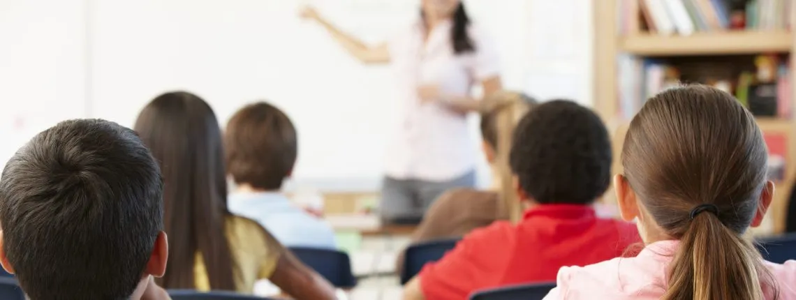 Teacher and children in class