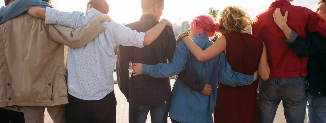 teenagers with their arms around each other