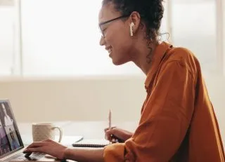 Woman on a video call with colleagues