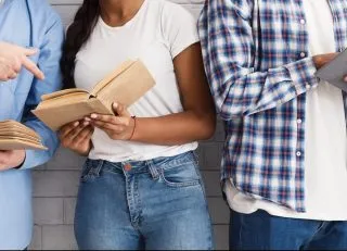 Diverse people with books in their hands
