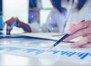 person looking at graphs